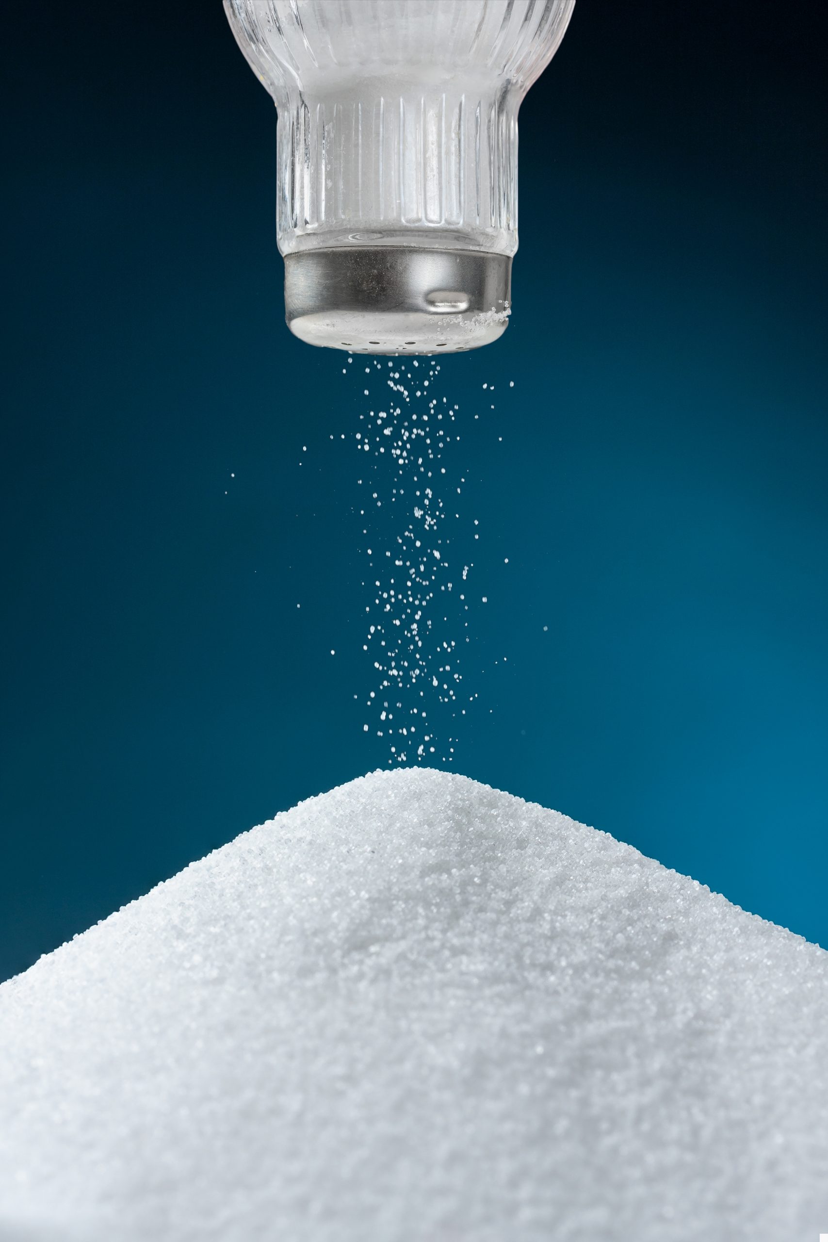 Pouring salt from a salt pot
