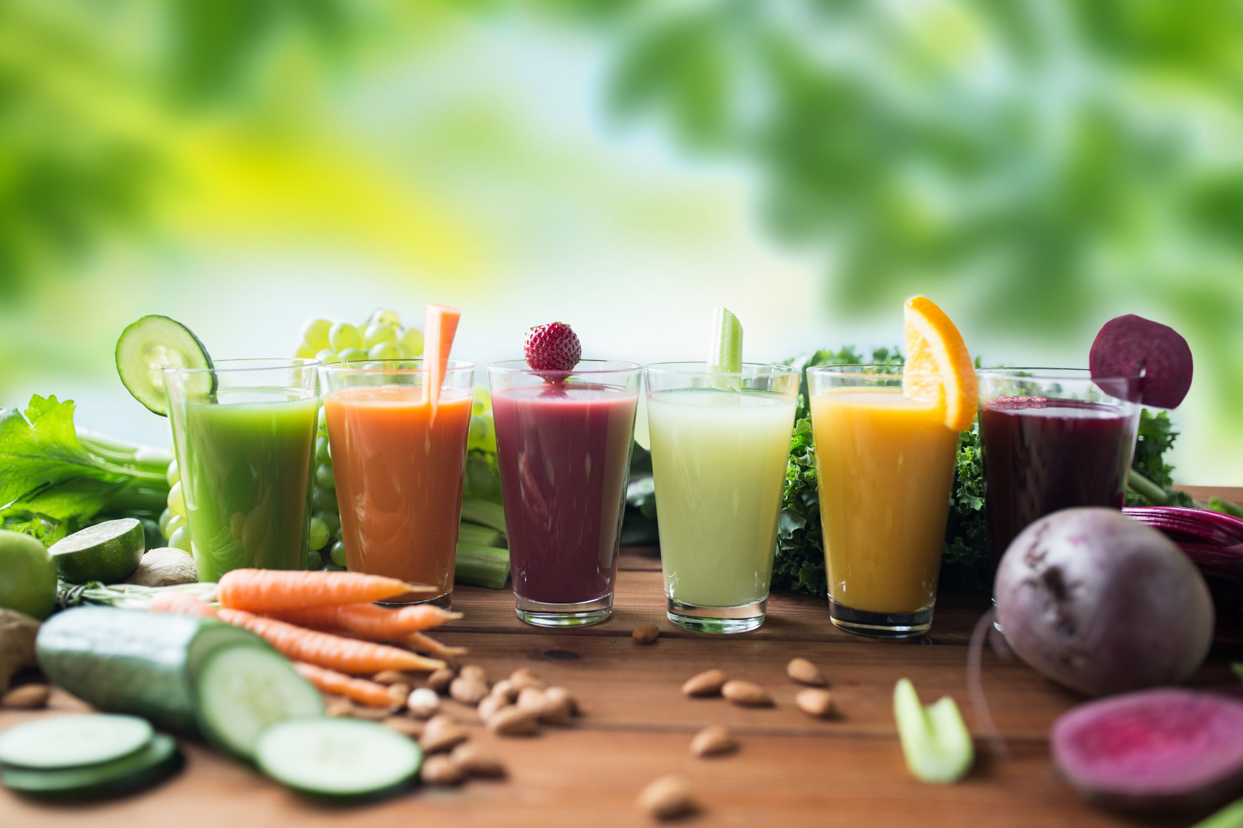 glasses with different fruit or vegetable juices